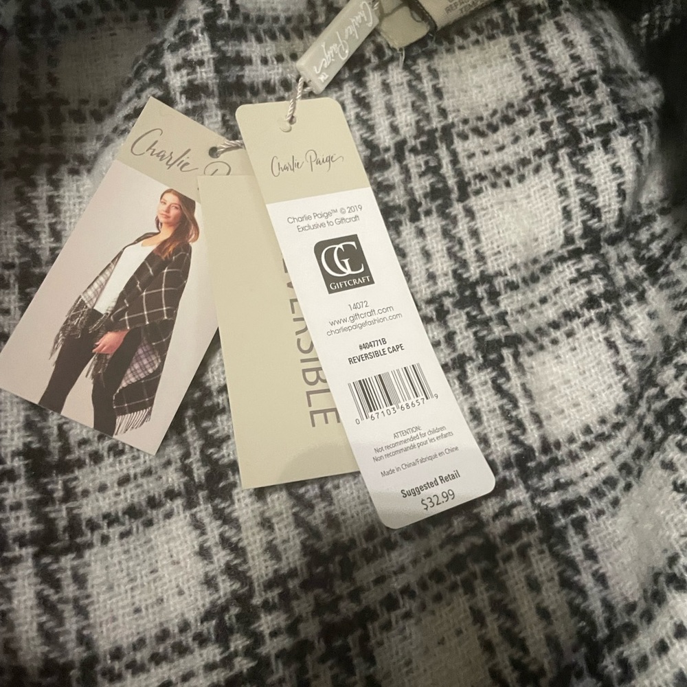 Brand new with tag Charlie Paige shawl ONE SIZE FITS ALL
